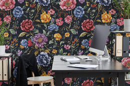 Trendy home office setup showcasing colorful botanical design, ideal for creative workspace inspiration