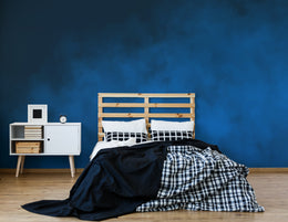 Elegant bedroom accent wall showcasing dark blue smooth texture, ideal for cozy modern bedroom styling