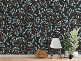 Luxurious office accent wall featuring dark botanical branches with soft blue leaves, premium workspace design