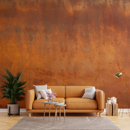 Cozy bedroom wall decor showcasing weathered metal rust texture in warm terracotta tones