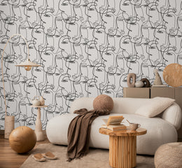 Elegant home interior decorated with abstract continuous portrait line artwork wall design forming statement feature background inside contemporary living room