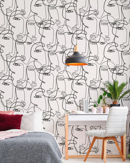 Calm bedroom space styled with minimalist facial outline illustration forming artistic decorative background