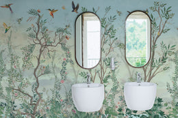 Decorative pastel woodland wallpaper mural with birds and blooming plants enhancing bathroom ambiance
