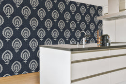 Elegant navy floral damask wallpaper adds dramatic depth to modern kitchen 