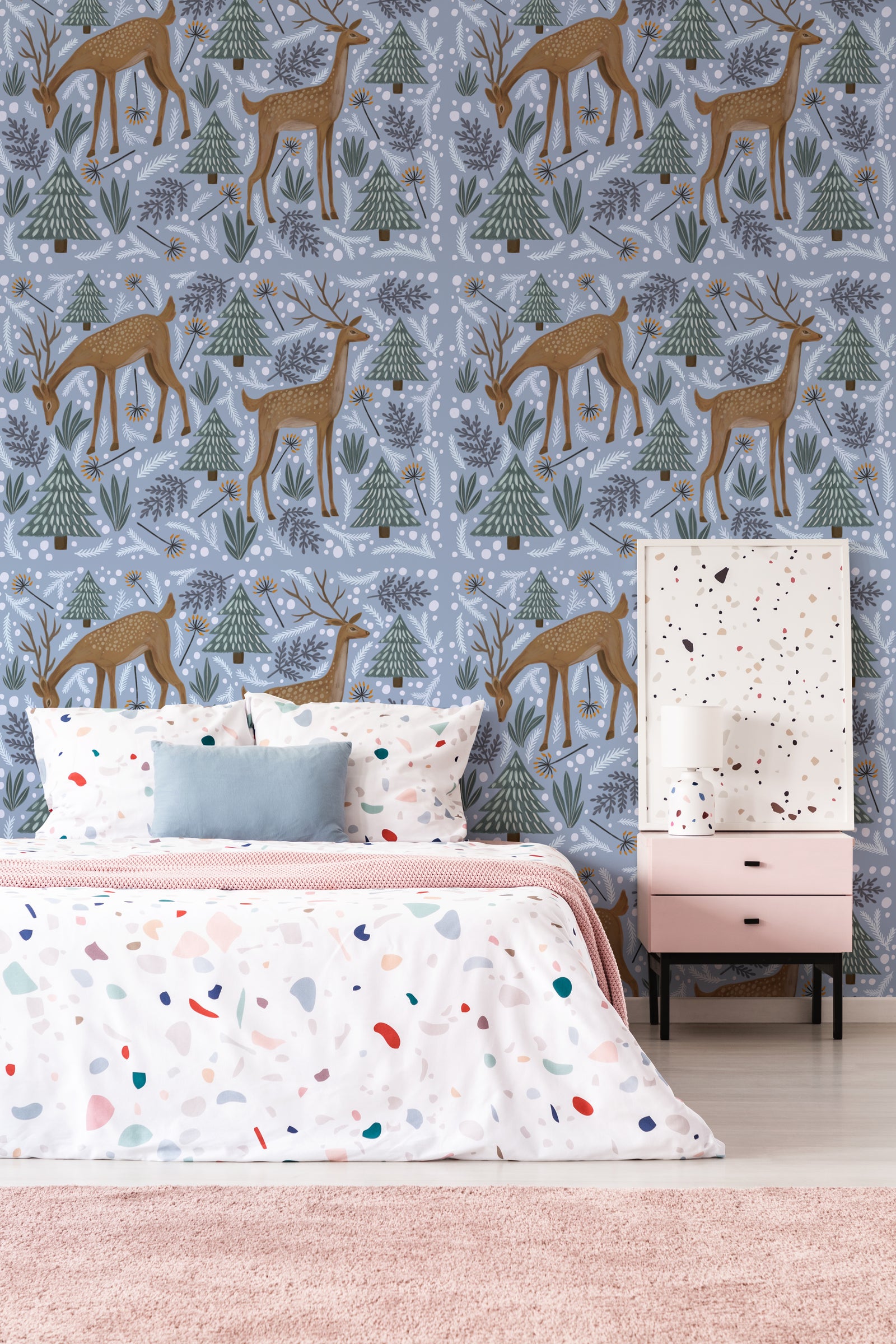 Soft blue deer and forest wall design adds charm to kids bedroom decor