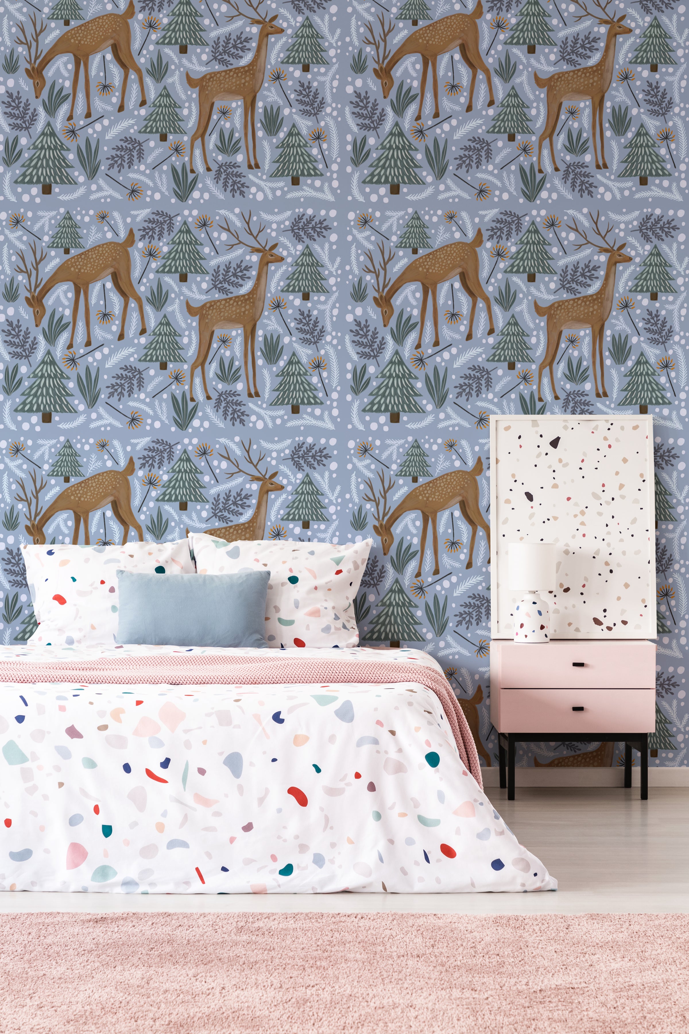 Soft blue deer and forest wall design adds charm to kids bedroom decor