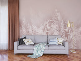 Blush palm leaf wall mural creating elegant botanical accent in modern living room decor