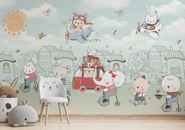 Cute adventure theme wallpaper showing bear riding bicycle, bus journey, airplane ride, and cheerful sky for children’s bedroom.