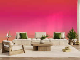 Bold living room decor with ombre wall mural, smooth pink orange gradient, built for luxury interiors