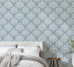 Powder blue ornamental damask background enhancing calm restful sleeping space with graceful decorative vintage texture.