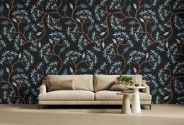 Sophisticated lounge area accent wall wallpaper with dark floral vines and subtle blue leaf accents