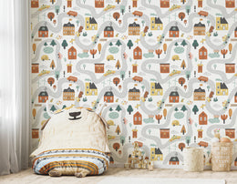 Patterned children’s wall design featuring illustrated school buildings, traffic routes, buses, and neighborhood homes.