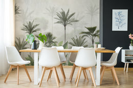 Tropical forest wall mural in subtle green hues enhancing stylish dining room ambiance