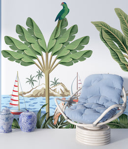 Coastal tropical mural featuring banana leaves and ocean vibe living room space