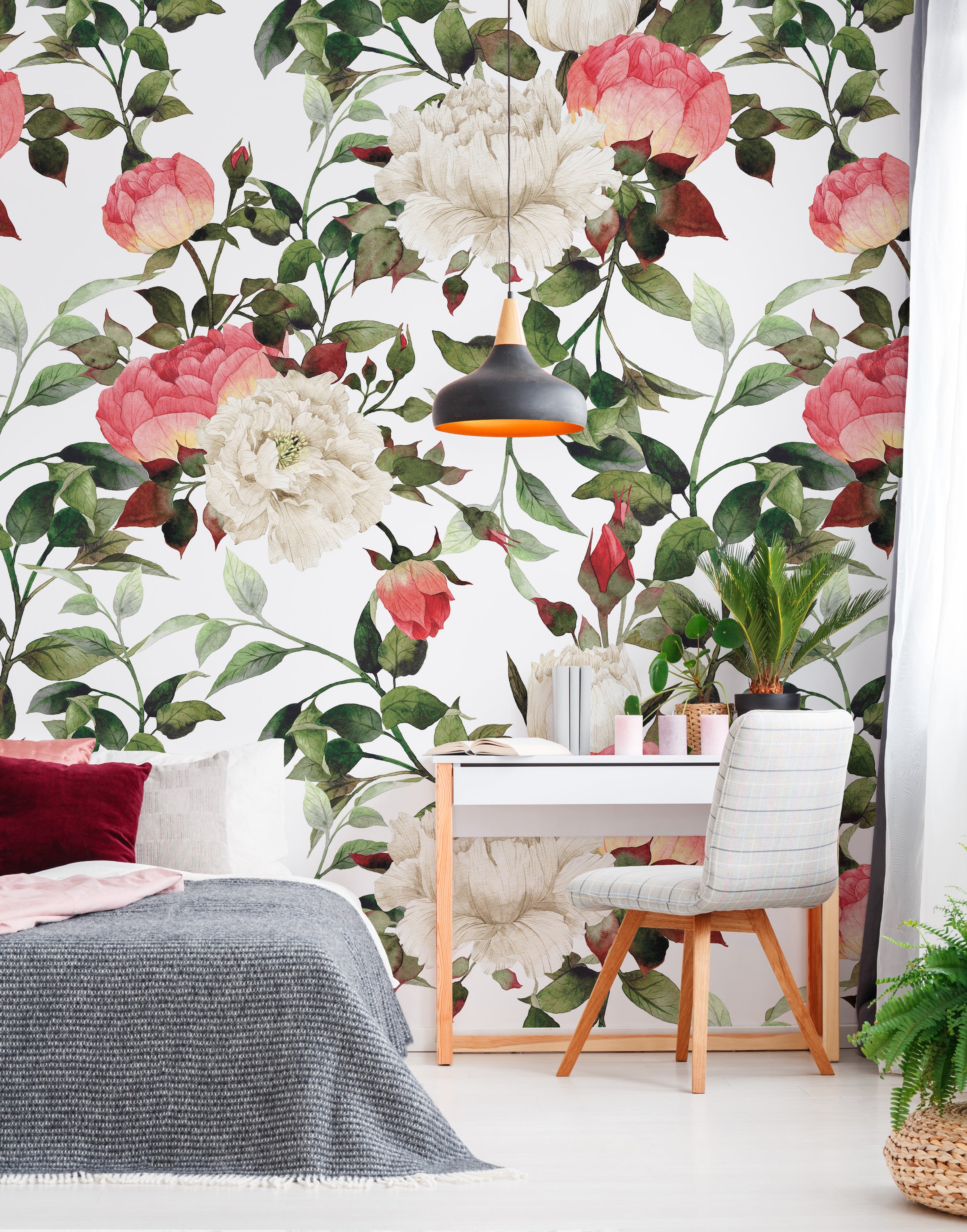 Vintage pink peony botanical wallpaper creates eye catching statement wall in apartment living area